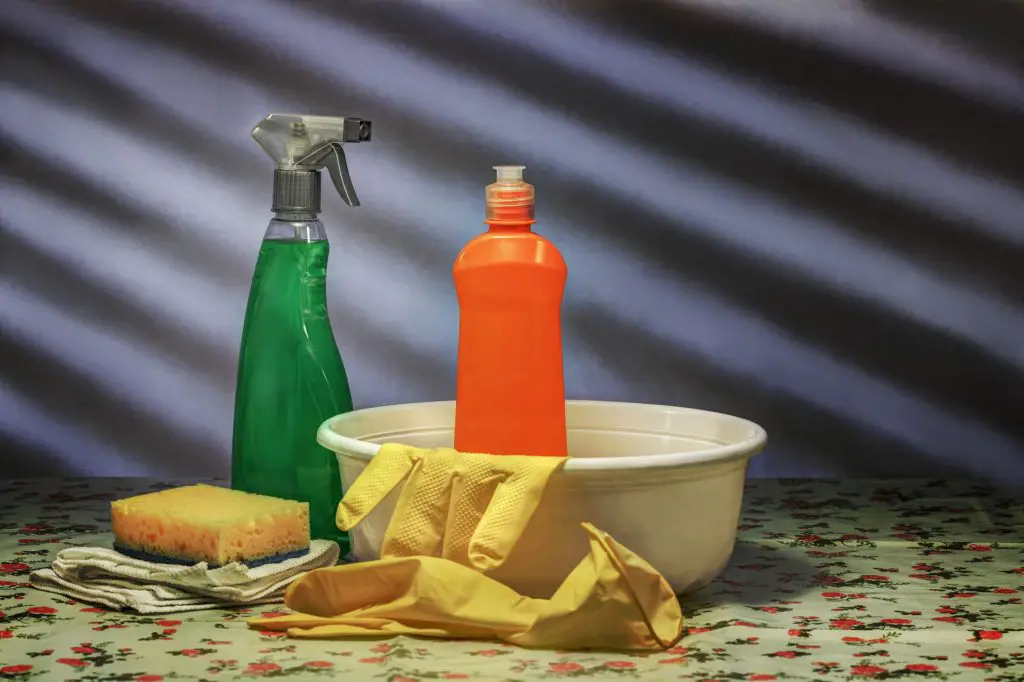 An image showing detergent to clean kitchen gloves